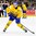 BUFFALO, NEW YORK - JANUARY 2: Sweden's Axel Jonsson Fjallby #22 attempts a shot on goal against Slovakia during the quarterfinal round of the 2018 IIHF World Junior Championship. (Photo by Andrea Cardin/HHOF-IIHF Images)

